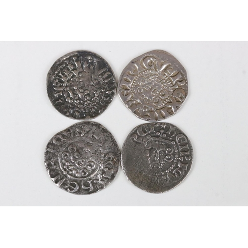 217 - A collection of four British King Henry III hammered silver coins to include three long cross pennie... 