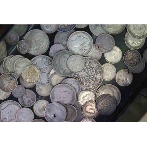 199 - A collection of British pre decimal silver coins contained within a vintage money box to include Que... 