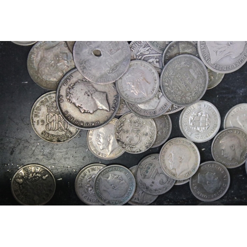 199 - A collection of British pre decimal silver coins contained within a vintage money box to include Que... 