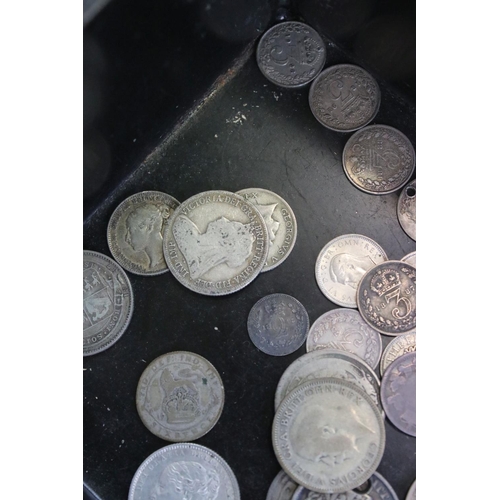 199 - A collection of British pre decimal silver coins contained within a vintage money box to include Que... 