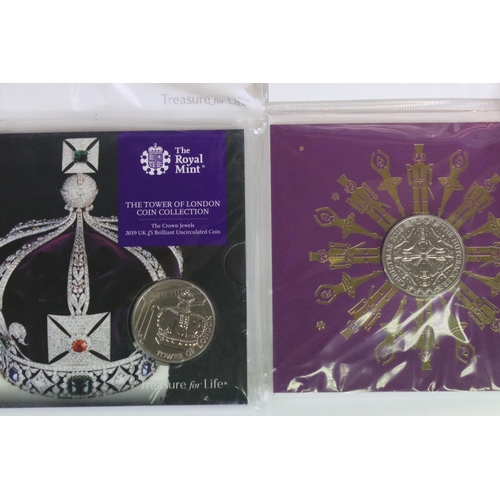 208 - A collection of Royal Mint £5 / Crown coin sets to include The Tower of London, Nutcracker and Engla... 