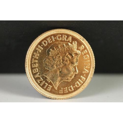 105 - A British Queen Elizabeth II 2002 gold half sovereign coin.