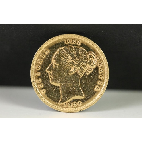 109 - A British Queen Victoria 1884 gold half sovereign coin.