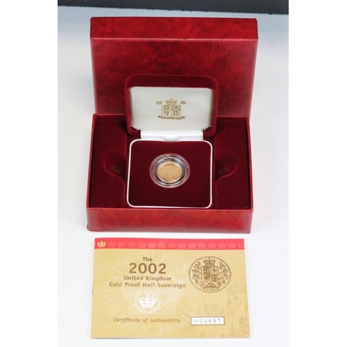 110 - A British Queen Elizabeth II 2002 United Kingdom gold proof half sovereign coin, complete with COA, ... 