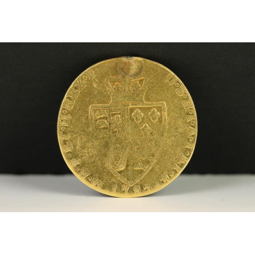 114 - A British King George III 1787 gold guinea coin.