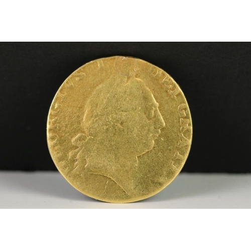 114 - A British King George III 1787 gold guinea coin.