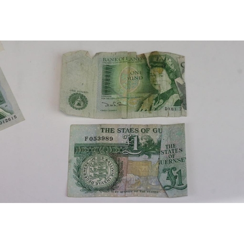 83 - A small collection of British banknotes to include £1, £5 and 10 Shilling examples.