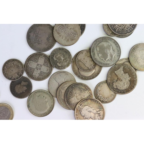 84 - A small collection of British pre decimal silver coins to include Queen Victoria and King Edward VII... 