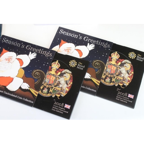 85 - A collection of Royal Mint Christmas coin collectors packs to include 2005, 2004 & 4 x 2008 year set... 