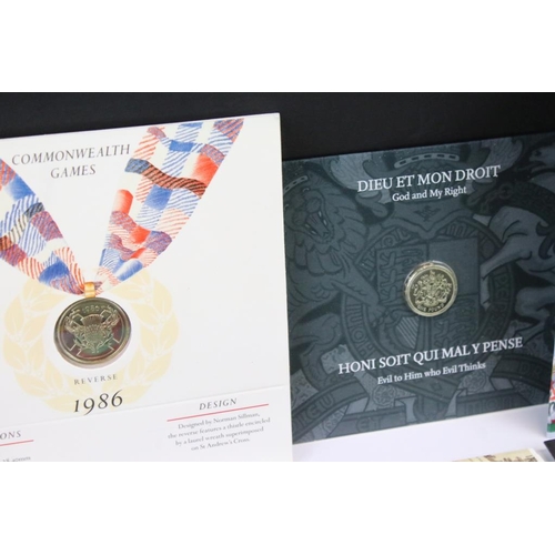 87 - A collection of British Royal Mint collectors coin packs, all sealed and uncirculated to include 50p... 