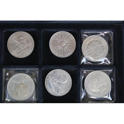 88 - A collection of British commemorative crown and £5 coins contained within a fitted box.