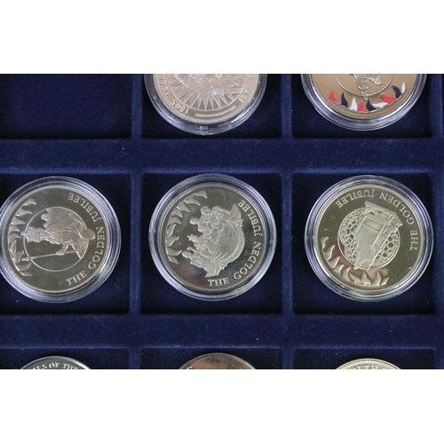 89 - A collection of commemorative coins to include the Solomon Islands, Gibraltar and Isle of Man exampl... 