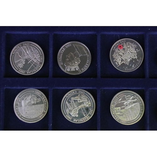 91 - A collection of twelve Gibraltar commemorative crown and £5 coins contained within a fitted box.