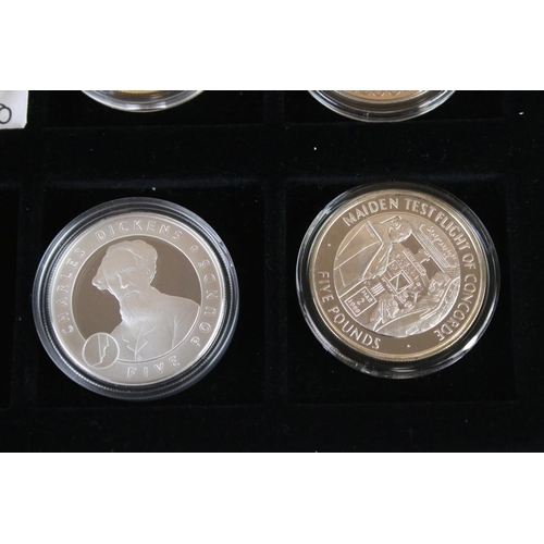 92 - A collection of twelve commemorative crown and £5 coins including silver examples.