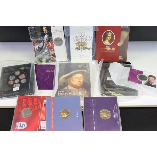 95 - A collection of Royal Mint coin collectors packs to include 2003 Royal Navy £5 coin, 2004 Golden Age... 