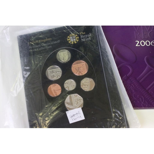 95 - A collection of Royal Mint coin collectors packs to include 2003 Royal Navy £5 coin, 2004 Golden Age... 