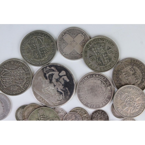 120 - A collection of British pre decimal silver coins to include Queen Victoria, King George III and King... 