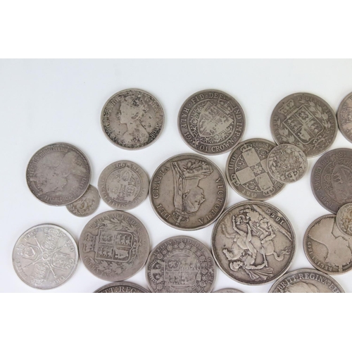 128 - A Collection of Queen Victoria British pre decimal silver coins to include Crowns, Half Crowns, Doub... 