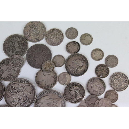 128 - A Collection of Queen Victoria British pre decimal silver coins to include Crowns, Half Crowns, Doub... 