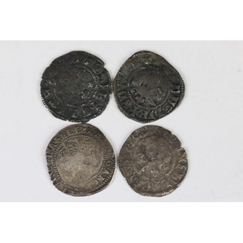 176 - A collection of four British hammered silver coins to include a Queen Elizabeth I example.