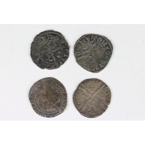 176 - A collection of four British hammered silver coins to include a Queen Elizabeth I example.