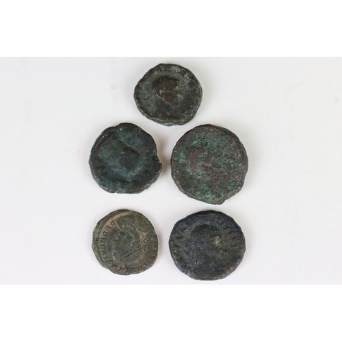 178 - A collection of five early Roman bronze coins.