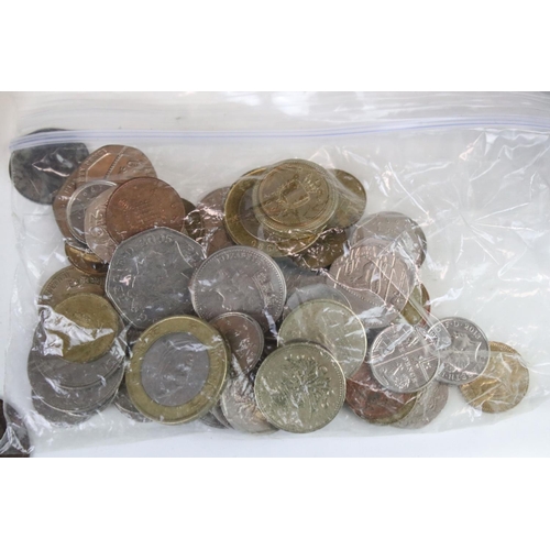 182 - A collection of British pre decimal and world coins to include some silver examples together with a ... 