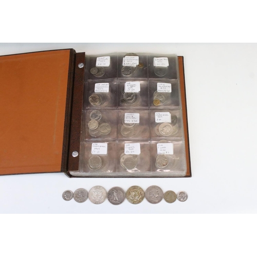 183 - A collection of United States of America coins contained within an album to include many silver and ... 