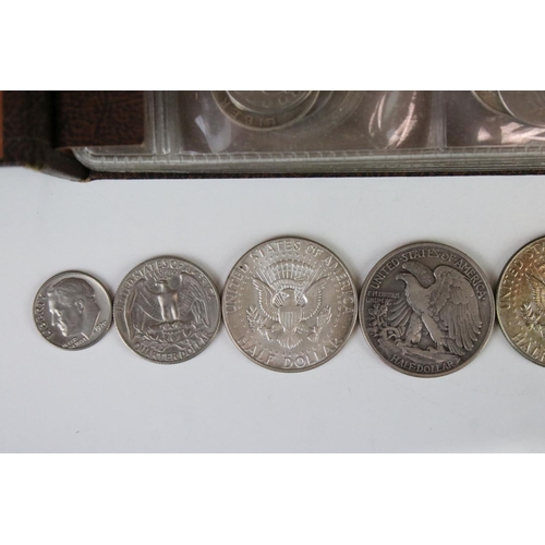 183 - A collection of United States of America coins contained within an album to include many silver and ... 