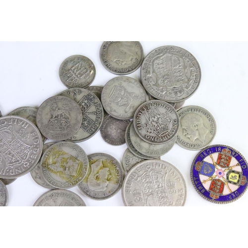 185 - A small collection of British pre decimal silver coins to include pre 1947 and pre 1920 examples.