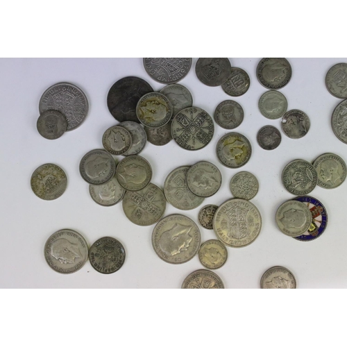 185 - A small collection of British pre decimal silver coins to include pre 1947 and pre 1920 examples.