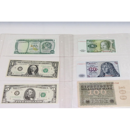 56 - A Collection Of Circulated And Uncirculated World Banknotes To Include Russia, Hong Kong, Malaysia, ... 