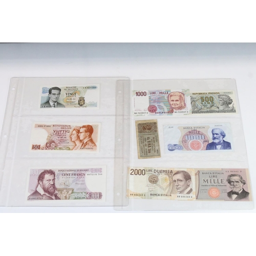 56 - A Collection Of Circulated And Uncirculated World Banknotes To Include Russia, Hong Kong, Malaysia, ... 