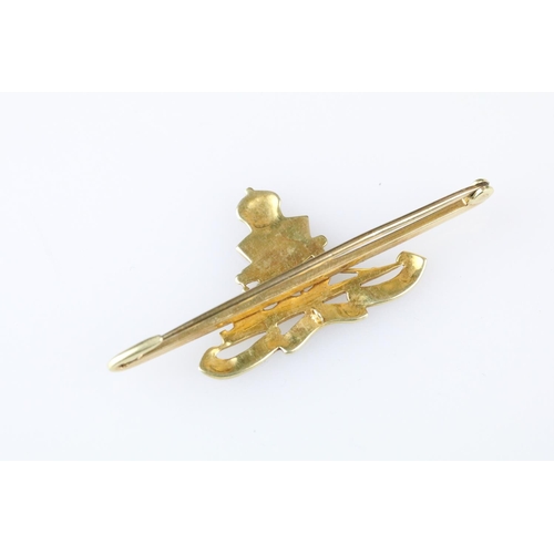 7 - Enamelled 15ct yellow gold Royal Artillery sweetheart brooch, length approx 5cm