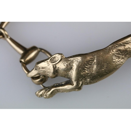 4 - 9ct yellow gold bracelet with central section modelled as a fox, the links modelled as riding stirru... 