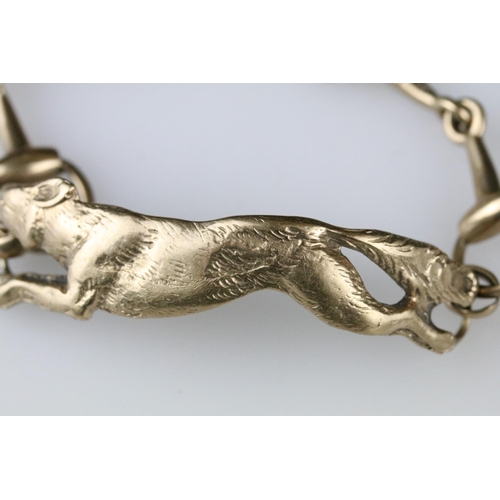 4 - 9ct yellow gold bracelet with central section modelled as a fox, the links modelled as riding stirru... 