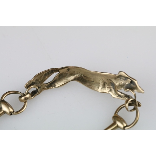 4 - 9ct yellow gold bracelet with central section modelled as a fox, the links modelled as riding stirru... 