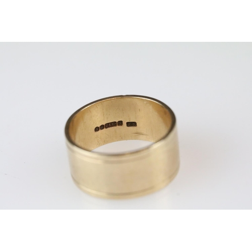 8 - 9ct yellow gold wedding band, width approx 10mm, ring size R