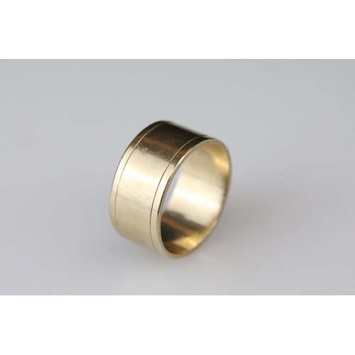 8 - 9ct yellow gold wedding band, width approx 10mm, ring size R