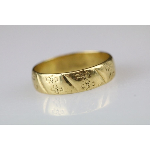 12 - 18ct yellow gold wedding band, engraved decoration, width approx 4.5mm, ring size M½