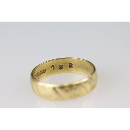 12 - 18ct yellow gold wedding band, engraved decoration, width approx 4.5mm, ring size M½