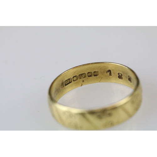 12 - 18ct yellow gold wedding band, engraved decoration, width approx 4.5mm, ring size M½