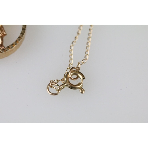 13 - 9ct gold highlander pendant necklace, the pendant diameter approx 18mm, length of chain approx 45cm