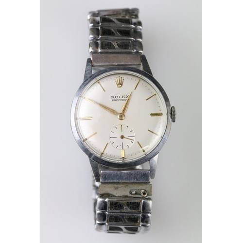 563 - Vintage Rolex Precision stainless steel wrist watch. The watch having a cream dial with gilt baton m... 