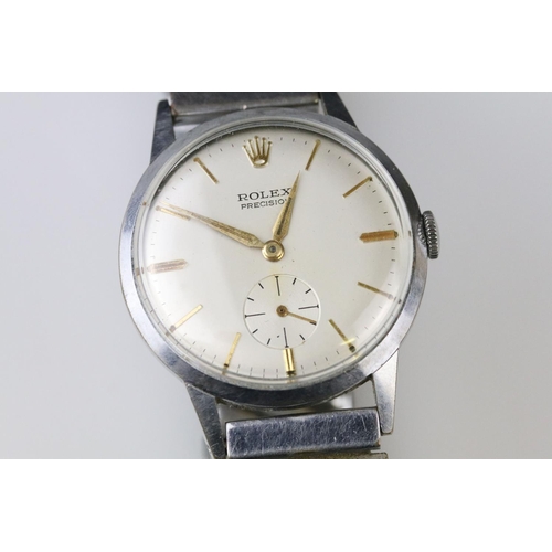 563 - Vintage Rolex Precision stainless steel wrist watch. The watch having a cream dial with gilt baton m... 