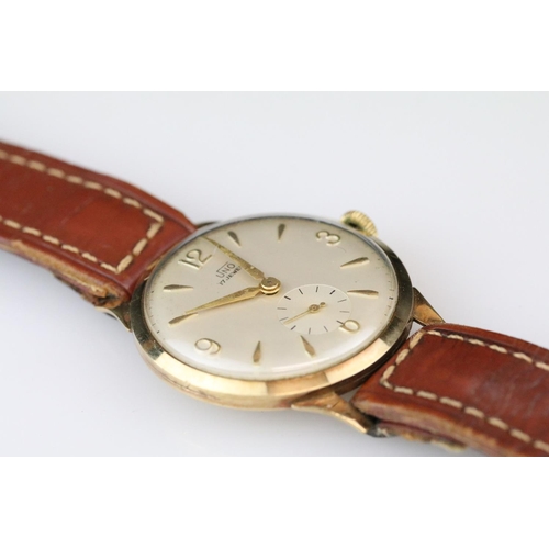 568 - Uno Gents wristwatch, yellow metal case, gilt Arabic and baton numeral markers, engraved presentatio... 