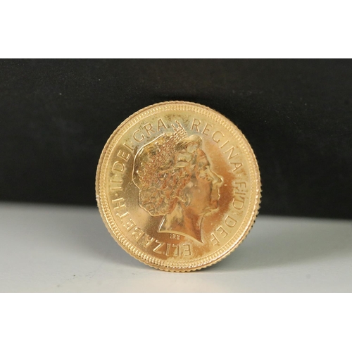 144 - A British Queen Elizabeth II 2001 gold half sovereign coin.