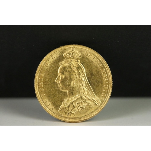 155 - A British Queen Victoria 1887 gold full sovereign coin.