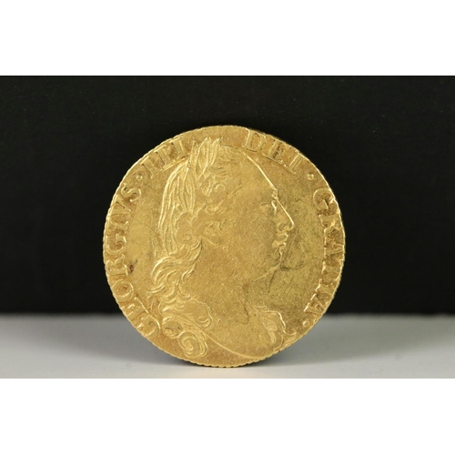 159 - A British King George III 1782 gold full guinea coin.