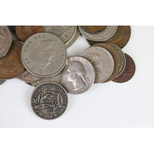 165 - A small collection of British and World coins to include silver and commemorative examples together ... 